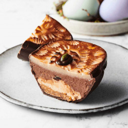 Easter egg with marzipan, rum cream truffle and nougat with chocolate Easter egg with marzipan, rum cream truffle and nougat with chocolate
