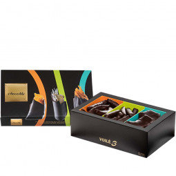 Voilé 3 - Pezzi di arancia, zenzero e mango avvolti nel cioccolato fondente Cioccolate